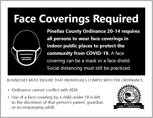 Picture of a black and white sign that has the headline "Face Coverings Required" and additional information. Click the image for the PDF.
